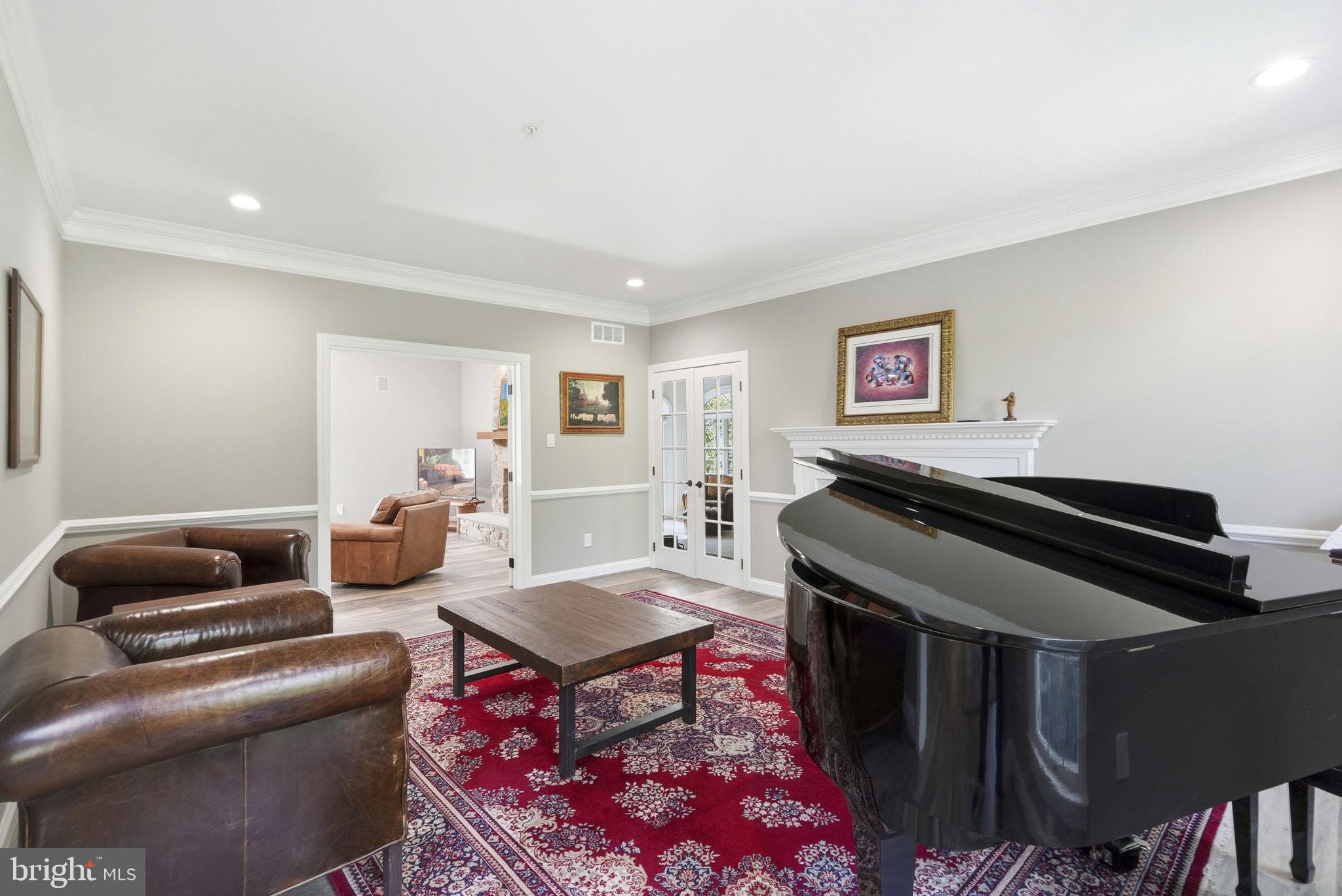 195 Carnoustie Way Media, PA 19063 - Photo 76 of 78 Elegant living space with grand piano.