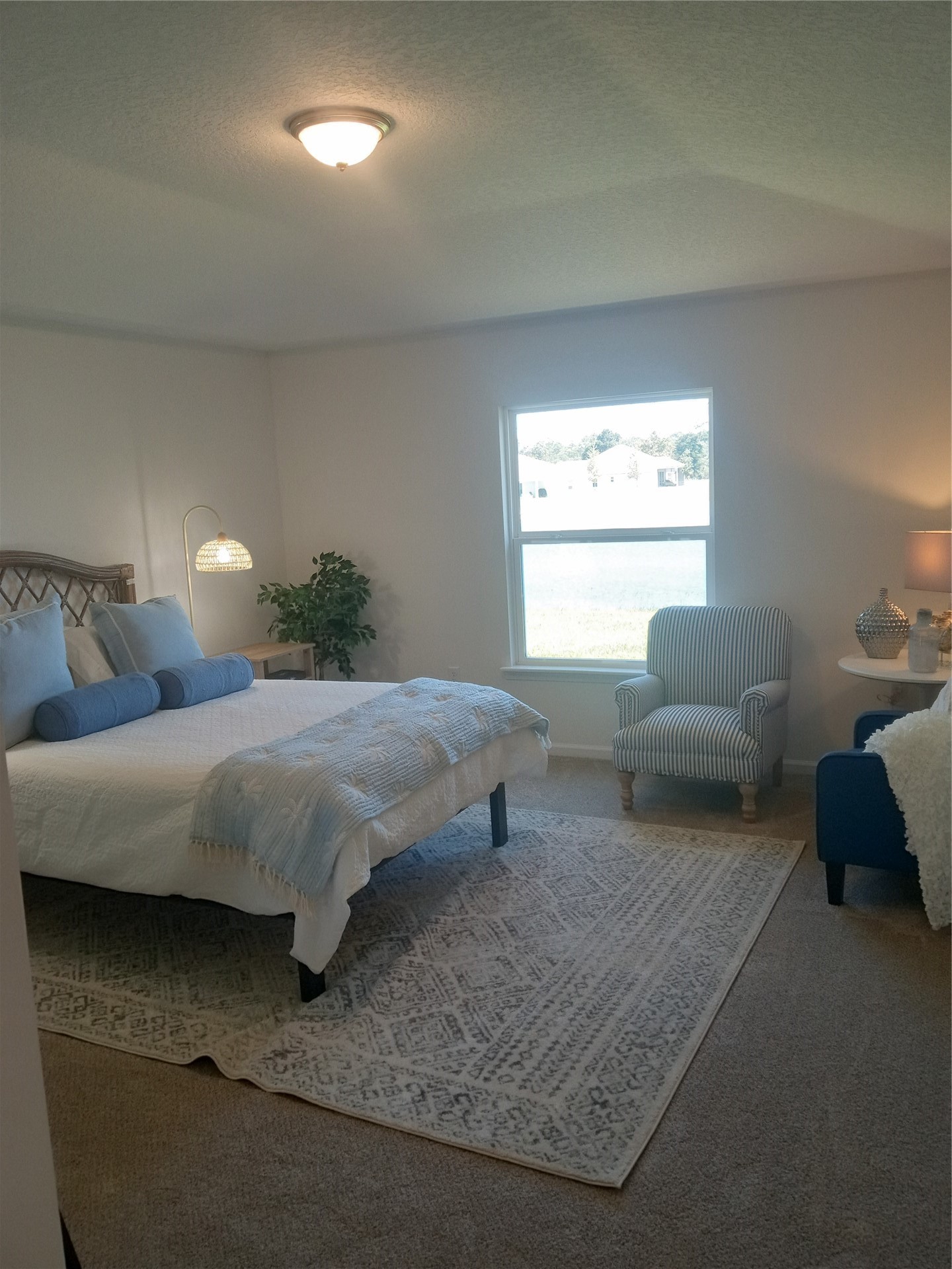 96052 Pirates Bluff Road Yulee, FL 32097 - Photo 14 of 22 a bedroom with a bed and a couch
