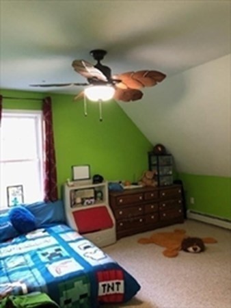 1230 Bemis Road Warren, MA 01083 - Photo 11 of 17 a bedroom with a bed and a chandelier