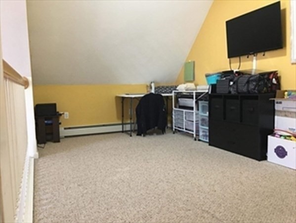 1230 Bemis Road Warren, MA 01083 - Photo 12 of 17 a view of a room with furniture and flat screen tv