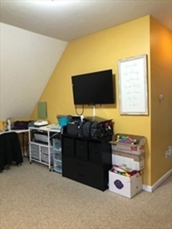 1230 Bemis Road Warren, MA 01083 - Photo 13 of 17 a room with furniture and flat screen tv