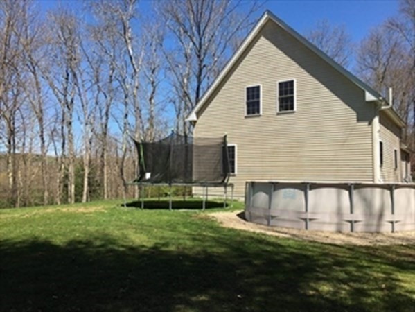 1230 Bemis Road Warren, MA 01083 - Photo 17 of 17 a view of a house with a yard