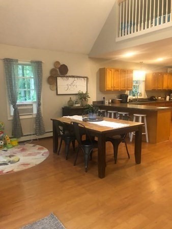 1230 Bemis Road Warren, MA 01083 - Photo 5 of 17 a kitchen with a table and chairs