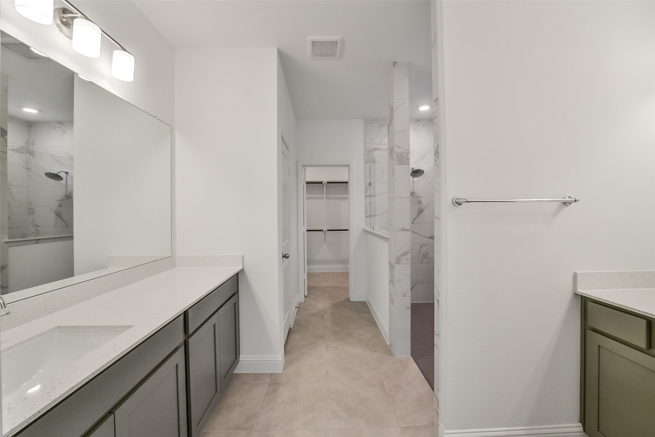 16018 Tangled Vine Lane Conroe, TX 77302 - Photo 22 of 41 a bathroom with a sink and a mirror