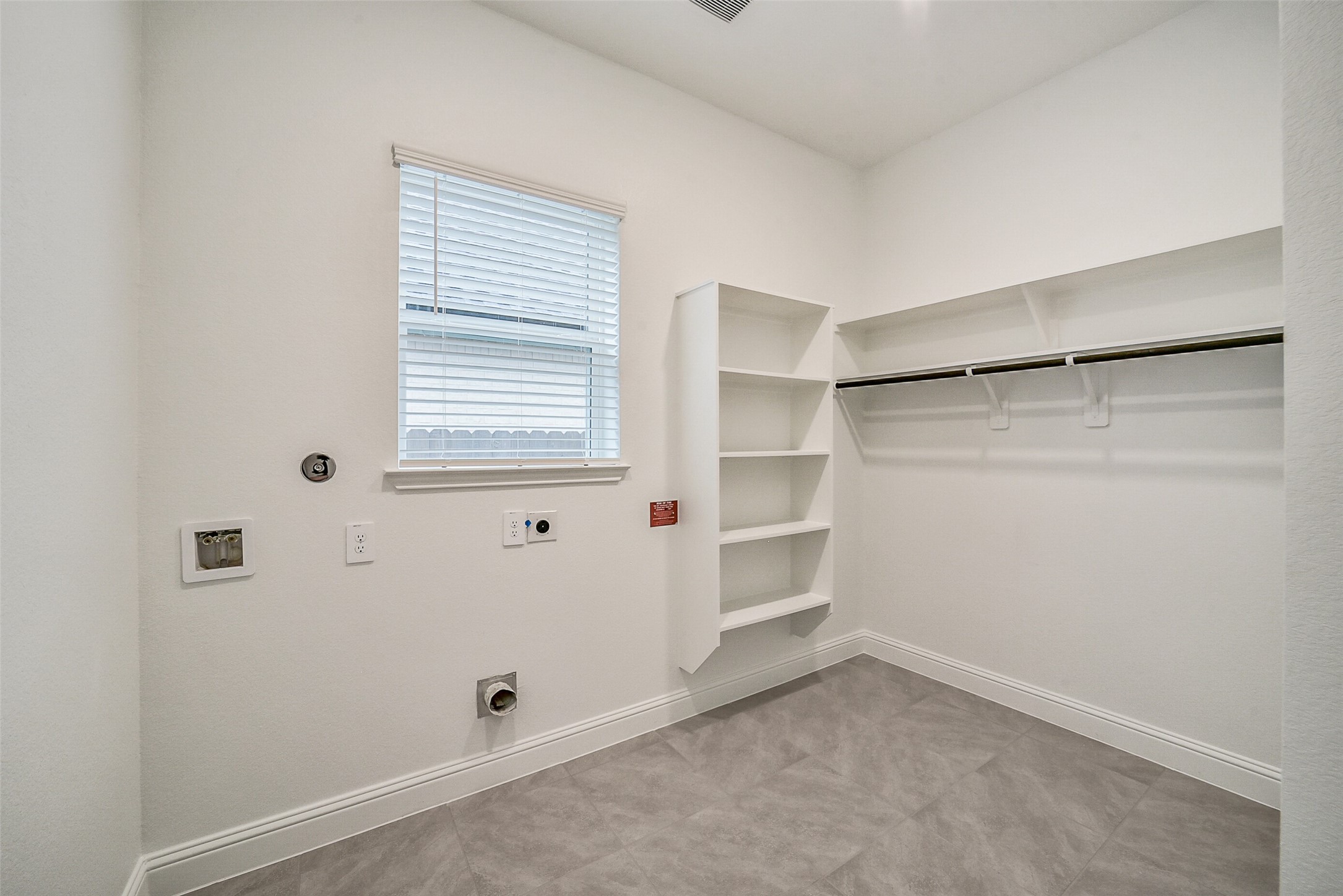 16018 Tangled Vine Lane Conroe, TX 77302 - Photo 29 of 41 a view of an empty room with a window