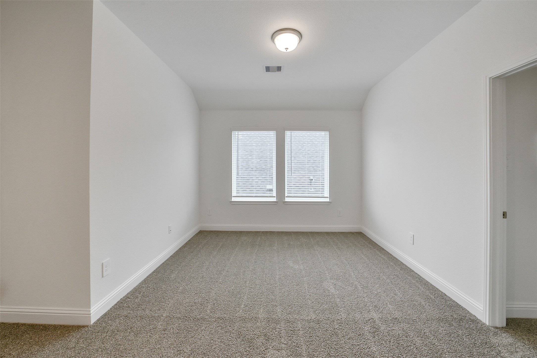 16018 Tangled Vine Lane Conroe, TX 77302 - Photo 32 of 41 an empty room with a window