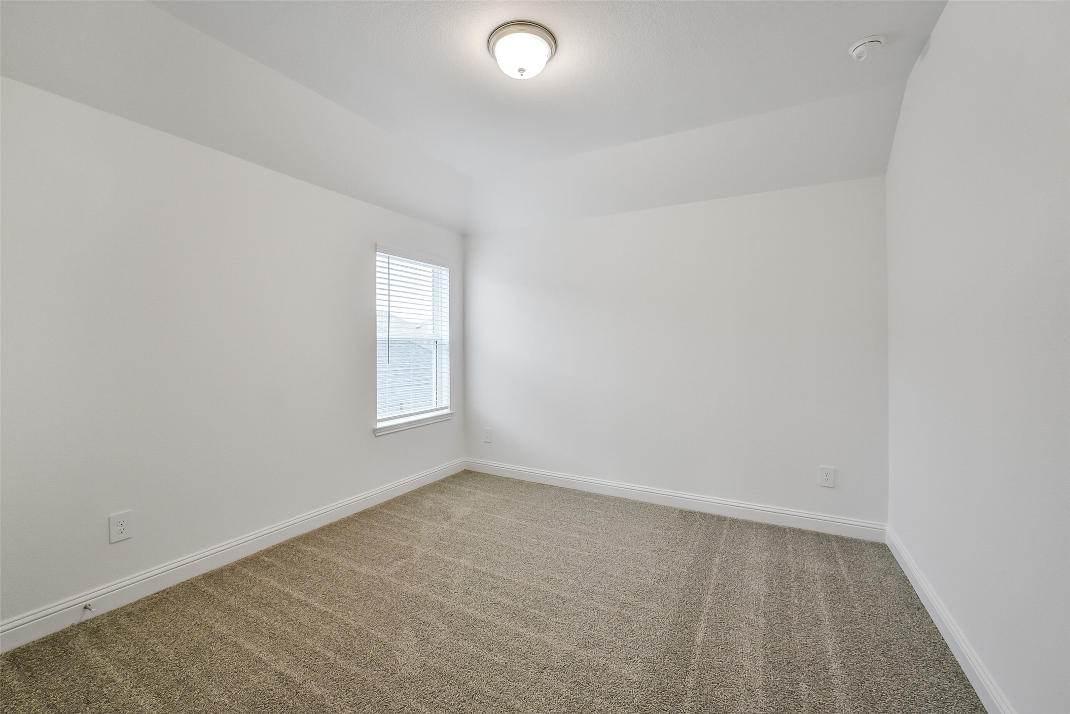 16018 Tangled Vine Lane Conroe, TX 77302 - Photo 35 of 41 an empty room with a window