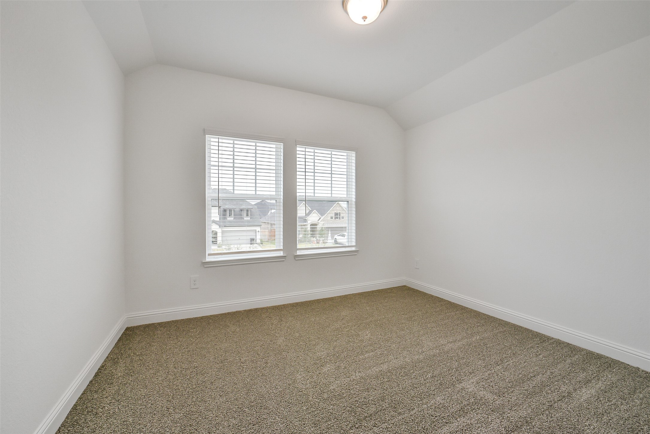 16018 Tangled Vine Lane Conroe, TX 77302 - Photo 37 of 41 an empty room with a window
