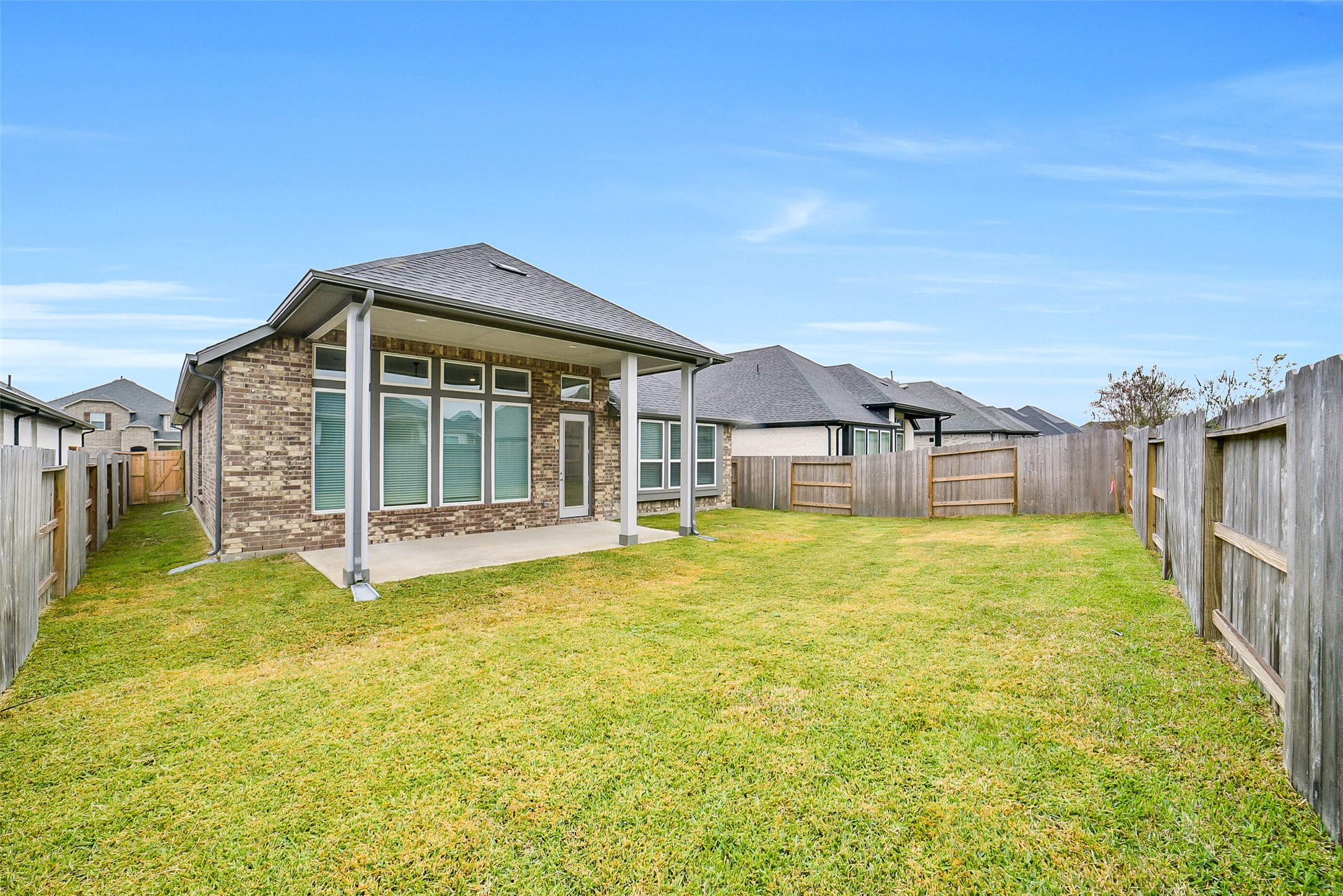 16018 Tangled Vine Lane Conroe, TX 77302 - Photo 40 of 41 a view of a house with a swimming pool