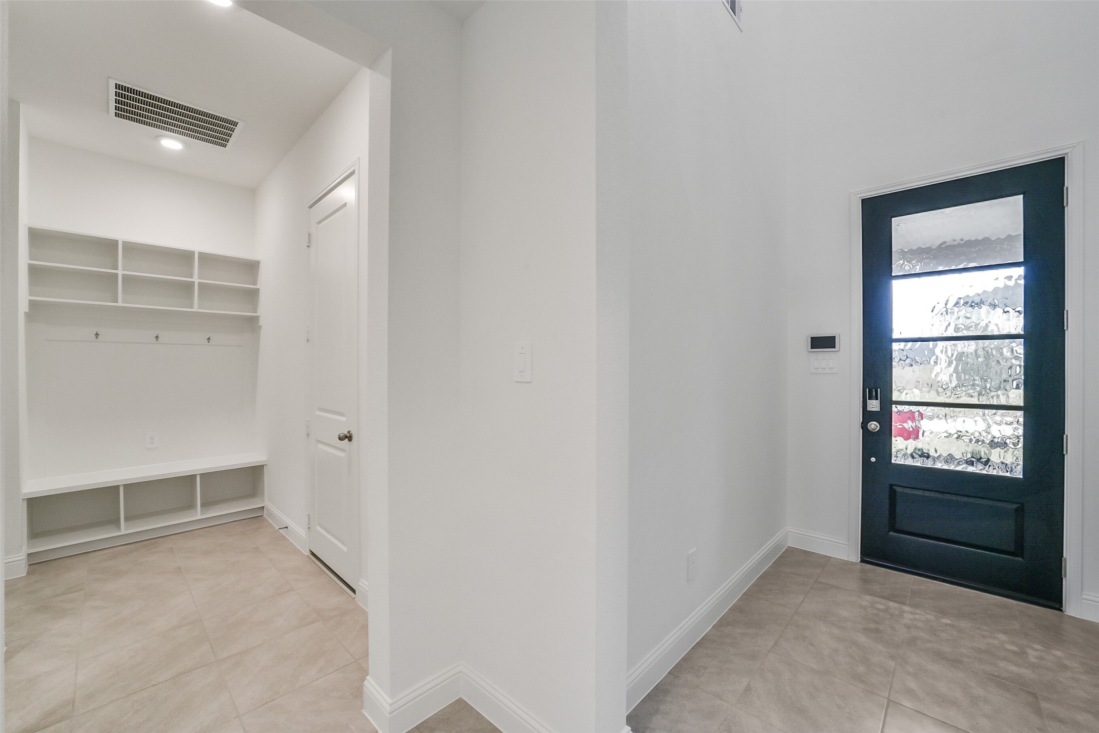 16018 Tangled Vine Lane Conroe, TX 77302 - Photo 4 of 41 an empty room with windows