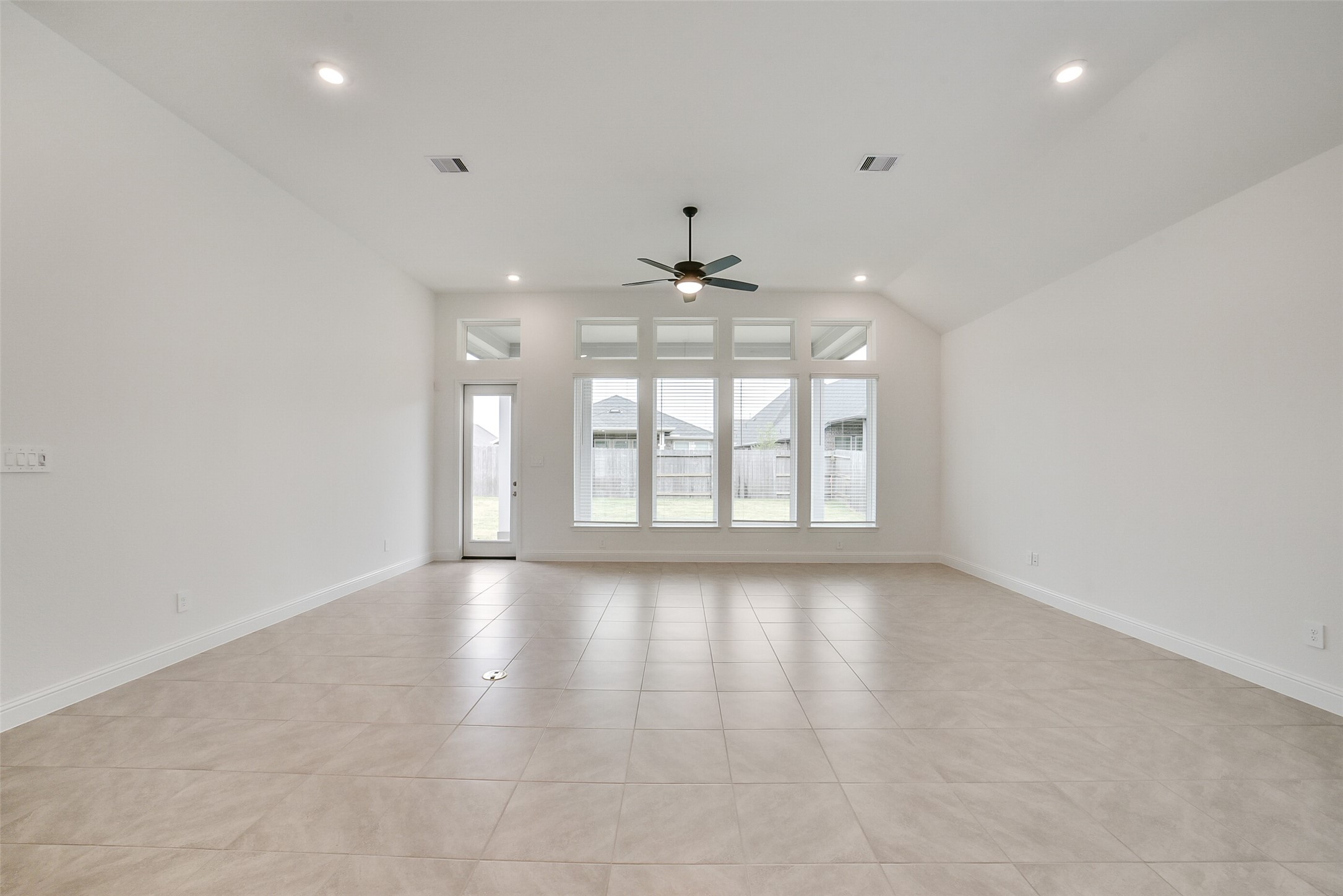 16018 Tangled Vine Lane Conroe, TX 77302 - Photo 8 of 41 a view of an empty room with a window