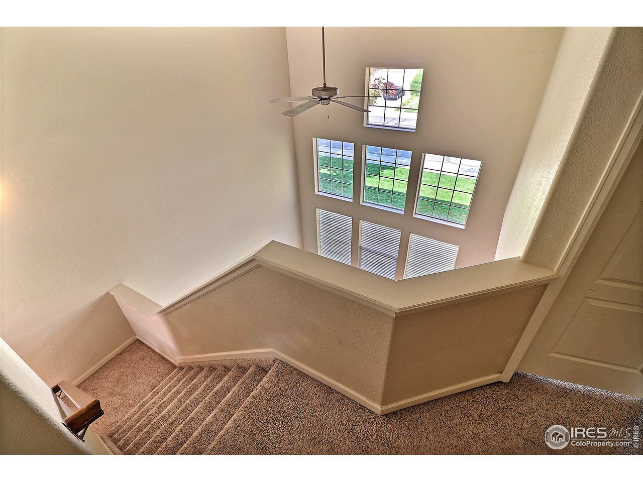5600 West 3rd Street, Unit 4 Greeley, CO 80634 - Photo 19 of 32 a view of an empty room with windows
