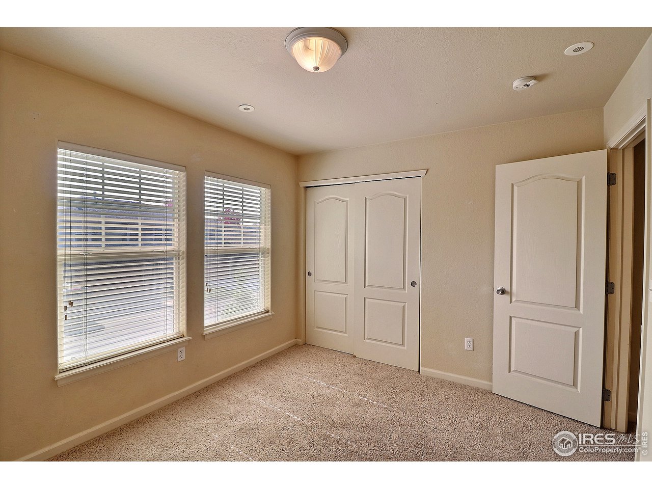 5600 West 3rd Street, Unit 4 Greeley, CO 80634 - Photo 27 of 32 a view of an empty room with a window