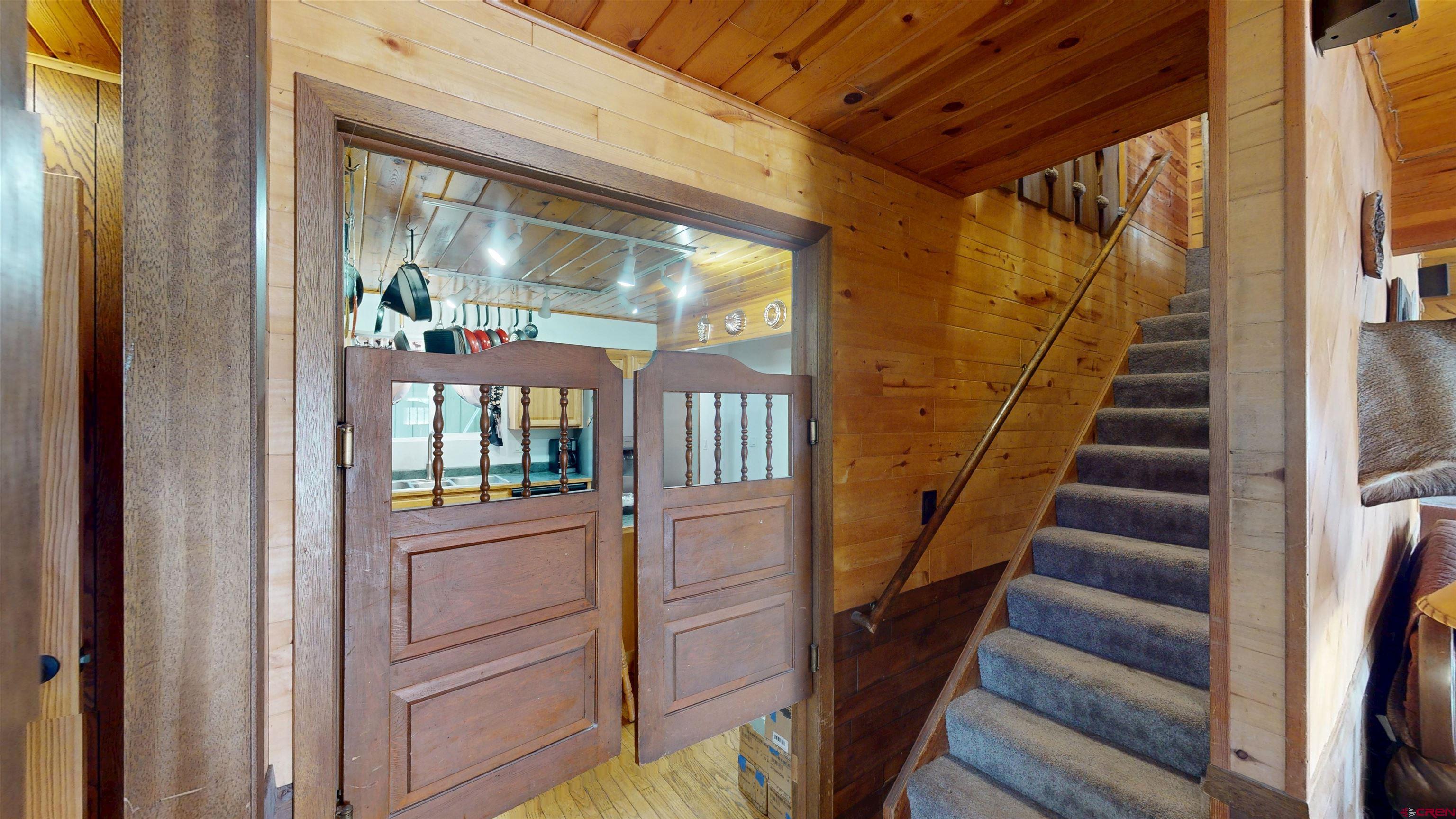 19253 Stevens Gulch Road Paonia, CO 81428 - Photo 27 of 43 a view of entryway and hall with wooden floor