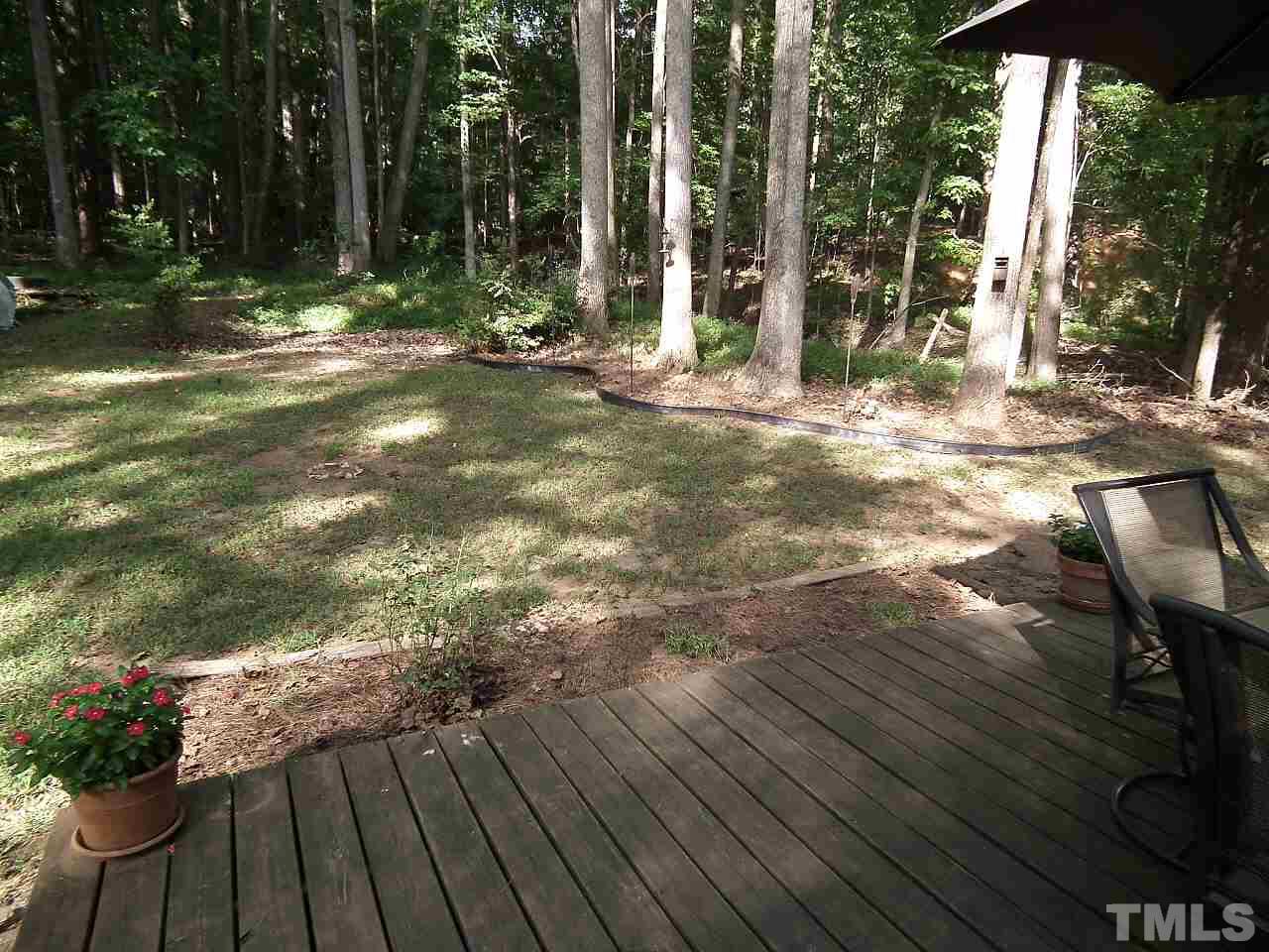 2824 Oak Ridge Court Raleigh, NC 27603 - Photo 14 of 22 a view of backyard with green space