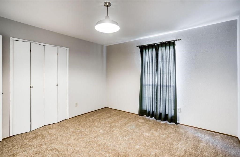 5656 Pearce Street The Colony, TX 75056 - Photo 11 of 23 a view of an empty room with a window