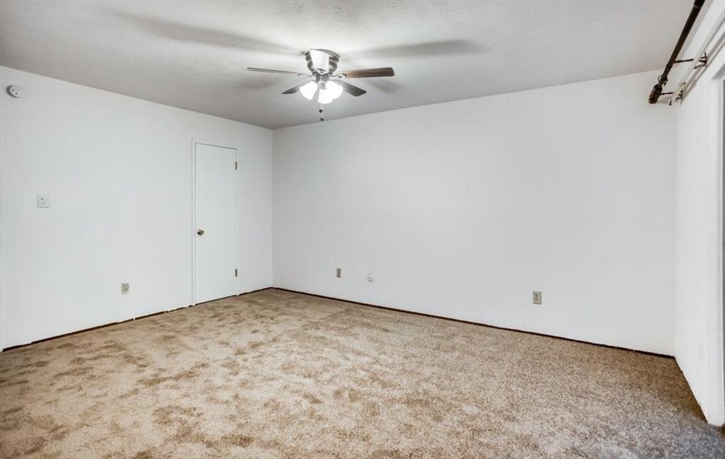 5656 Pearce Street The Colony, TX 75056 - Photo 14 of 23 a view of a room with an empty space