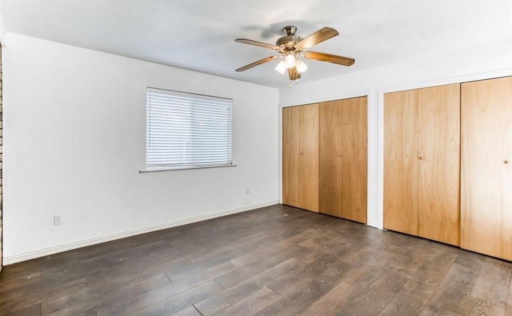 5656 Pearce Street The Colony, TX 75056 - Photo 16 of 23 an empty room with windows and fan