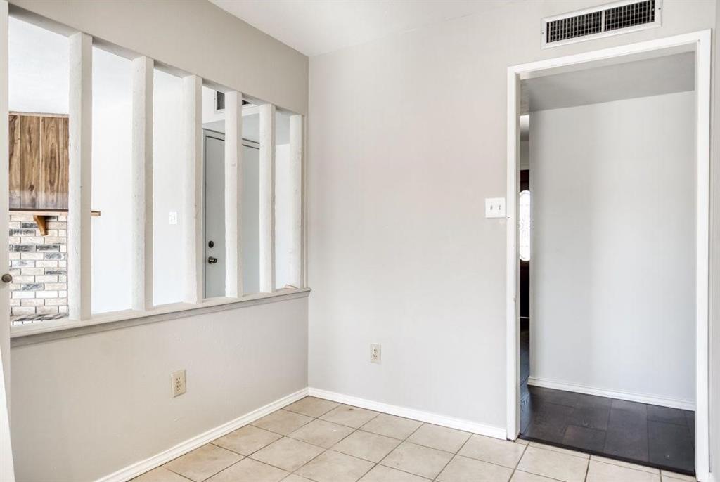 5656 Pearce Street The Colony, TX 75056 - Photo 7 of 23 a view of a bedroom with wooden floor and windows