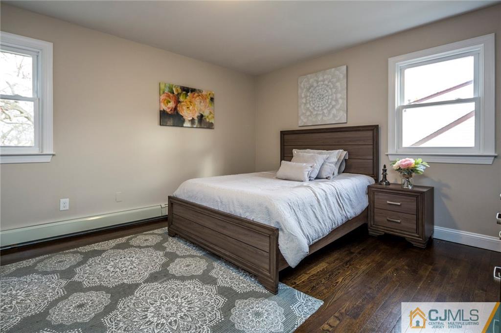 66 Middlesex Road Matawan, NJ 07747 - Photo 16 of 22 a bedroom with a bed and a window