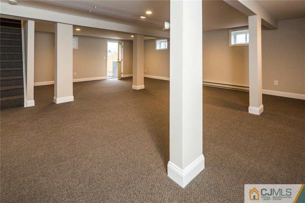 66 Middlesex Road Matawan, NJ 07747 - Photo 19 of 22 an empty room with windows