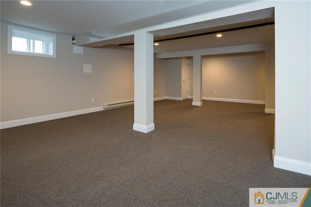 66 Middlesex Road Matawan, NJ 07747 - Photo 20 of 22 an empty room with windows