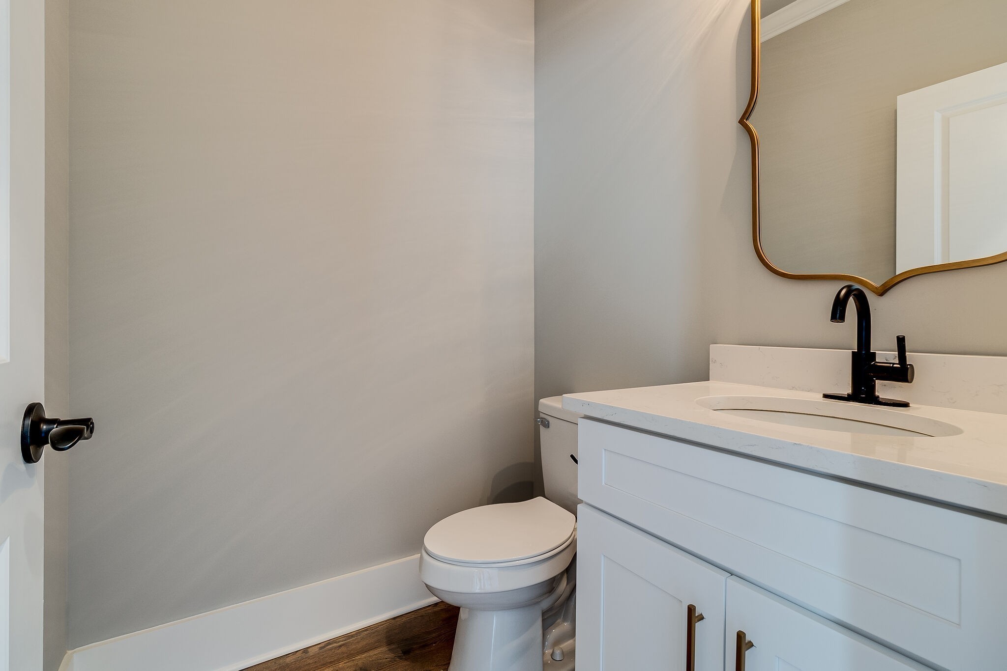 3003 Turnstone Trace Spring Hill, TN 37174 - Photo 14 of 26 a bathroom with a sink toilet and a mirror