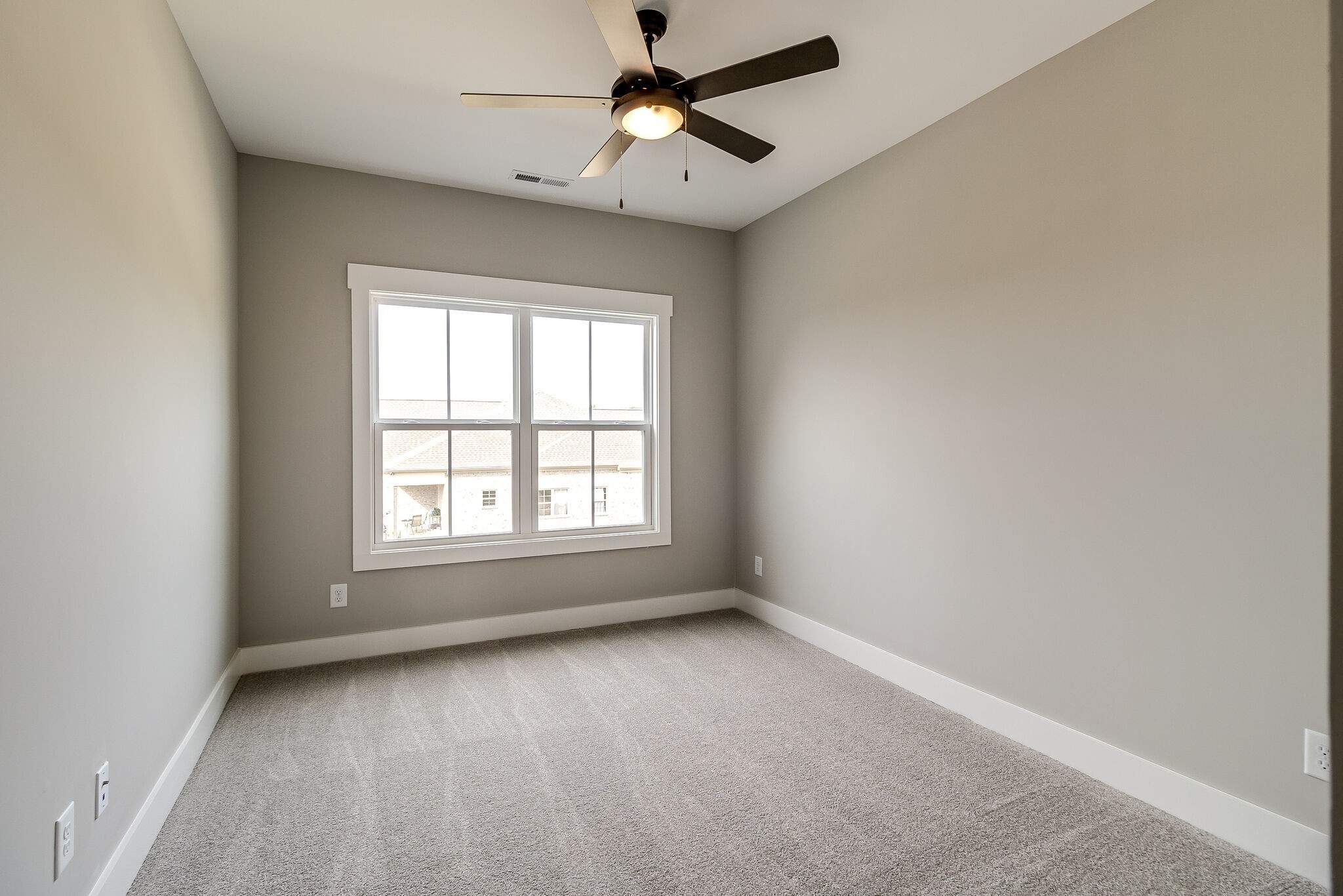 3003 Turnstone Trace Spring Hill, TN 37174 - Photo 21 of 26 an empty room with a window and a fan