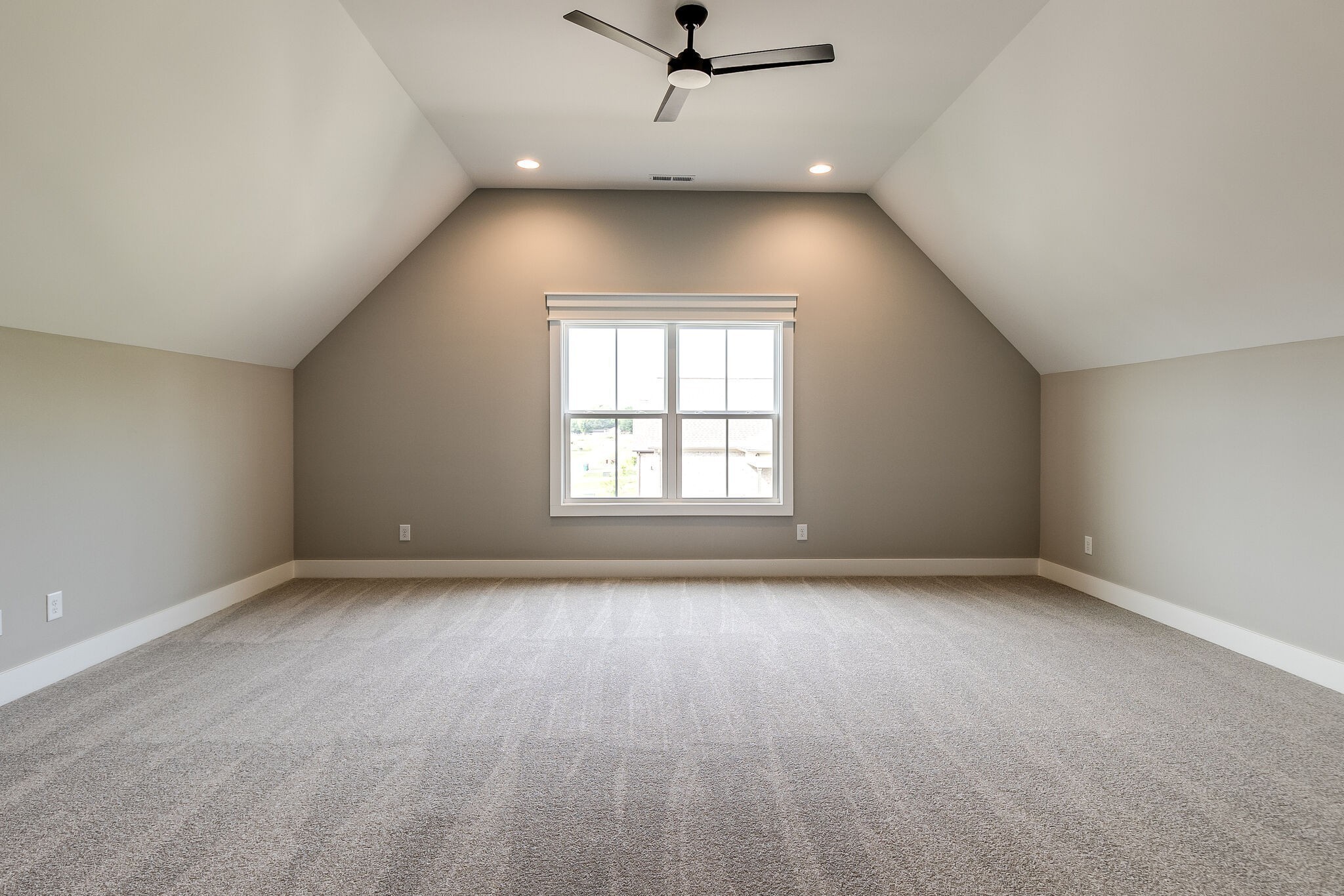 3003 Turnstone Trace Spring Hill, TN 37174 - Photo 23 of 26 an empty room with a window and a ceiling fan