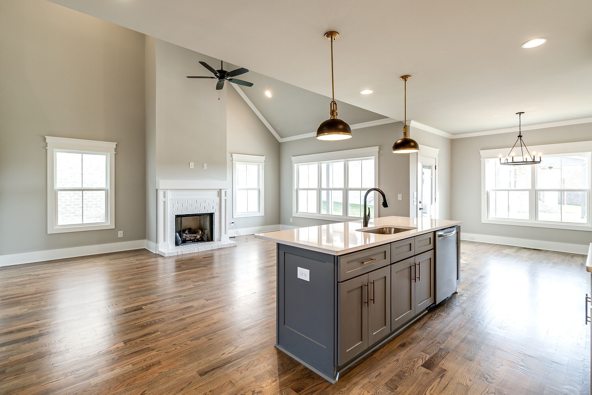 3003 Turnstone Trace Spring Hill, TN 37174 - Photo 10 of 26 a kitchen with stainless steel appliances granite countertop a stove and a wooden floor