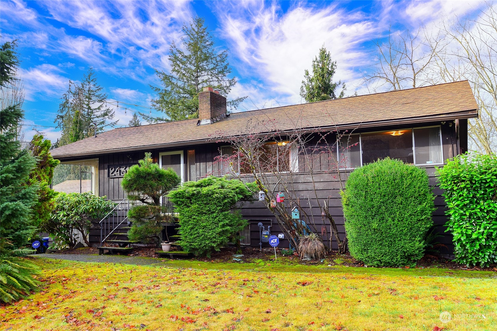 24318 7th Avenue West Bothell, WA 98021 - Photo 1 of 19 a view of a house with backyard and sitting area