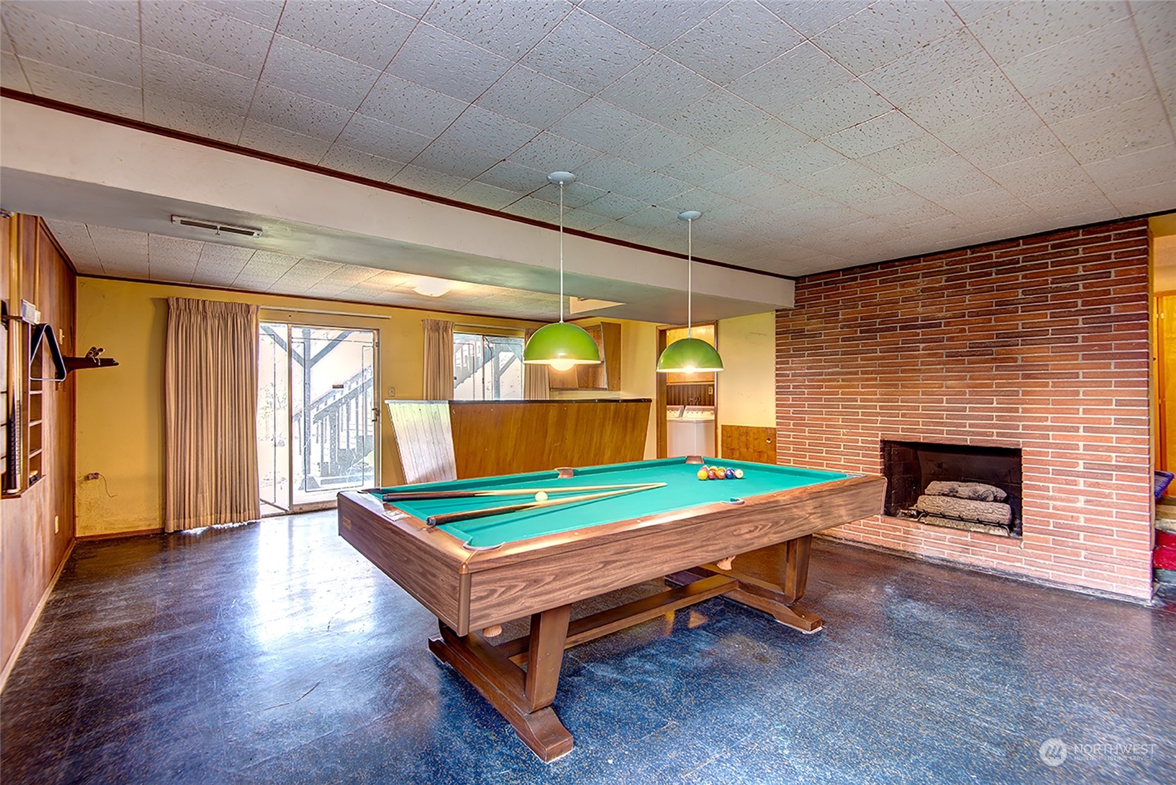24318 7th Avenue West Bothell, WA 98021 - Photo 11 of 19 a room with wooden floor pool table and windows