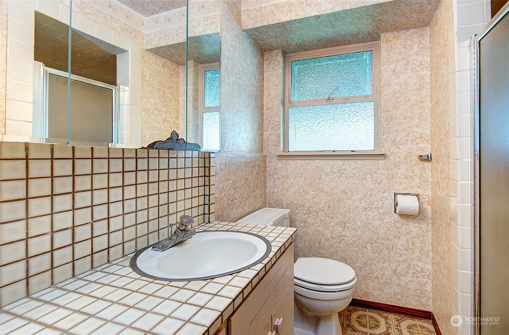 24318 7th Avenue West Bothell, WA 98021 - Photo 15 of 19 a bathroom with a toilet and a sink