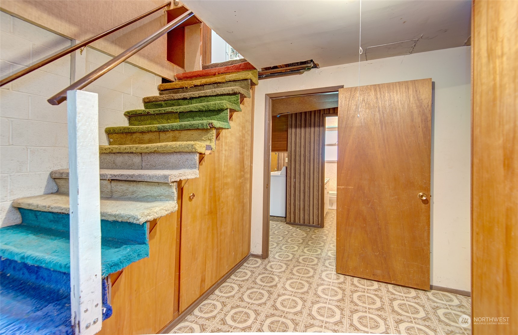 24318 7th Avenue West Bothell, WA 98021 - Photo 9 of 19 a view of a hallway with wooden floor and entryway
