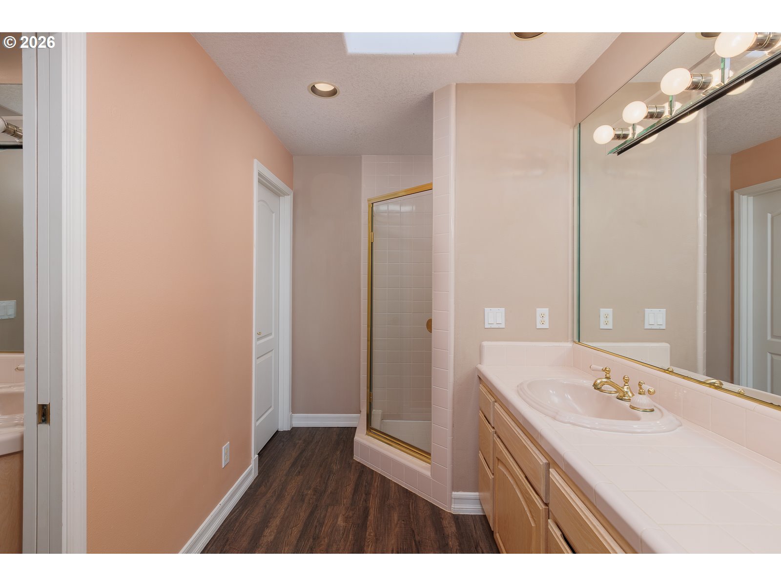 626 North Bayview Loop Waldport, OR 97394 - Photo 24 of 38 a bathroom with a sink and a mirror