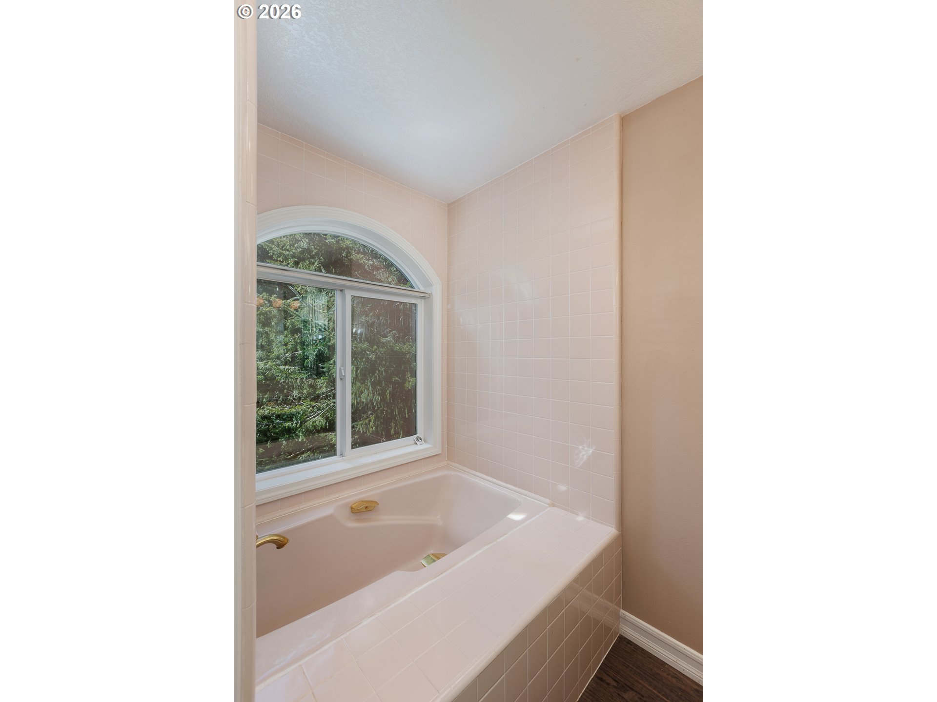 626 North Bayview Loop Waldport, OR 97394 - Photo 25 of 38 a bathroom with a tub shower and sink