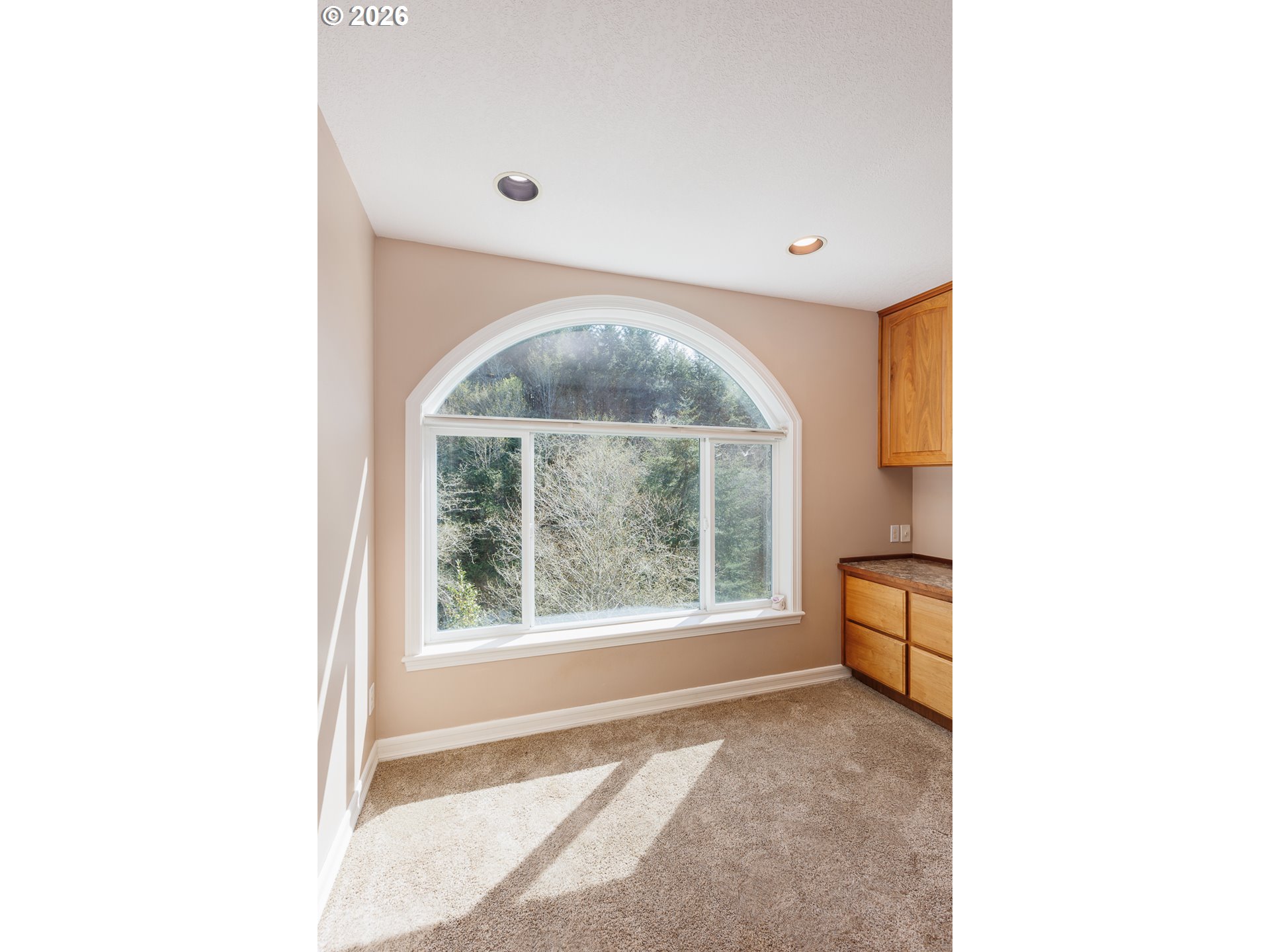 626 North Bayview Loop Waldport, OR 97394 - Photo 27 of 38 a view of an empty room with a window