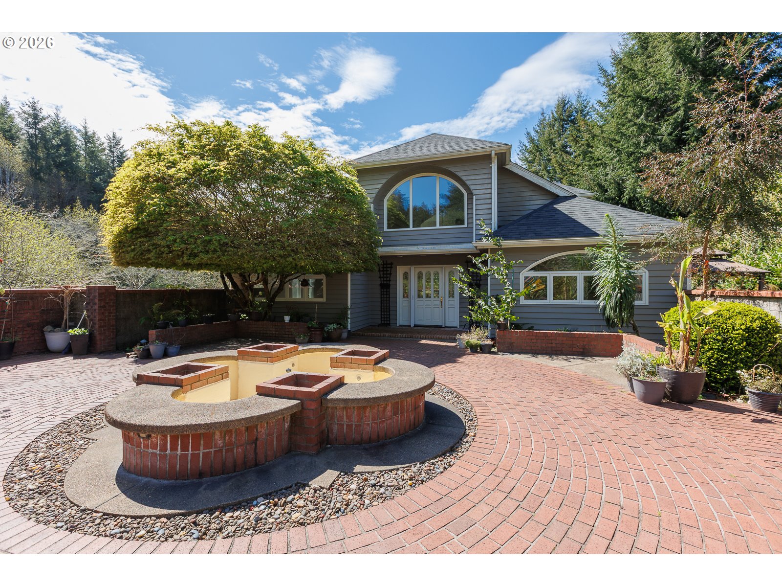 626 North Bayview Loop Waldport, OR 97394 - Photo 3 of 38 a outdoor space with swimming pool and furniture