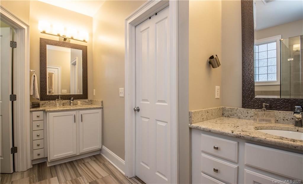 728 Shady Grove Crossing Fort Mill, SC 29708 - Photo 17 of 41 a bathroom with a granite countertop sink and a mirror