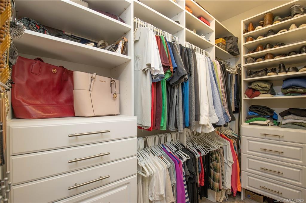 728 Shady Grove Crossing Fort Mill, SC 29708 - Photo 19 of 41 a view of walk in closet with clothes and shoes