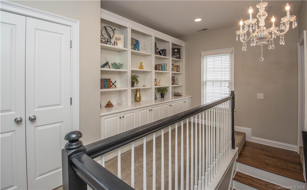728 Shady Grove Crossing Fort Mill, SC 29708 - Photo 21 of 41 a view of a hallway with windows