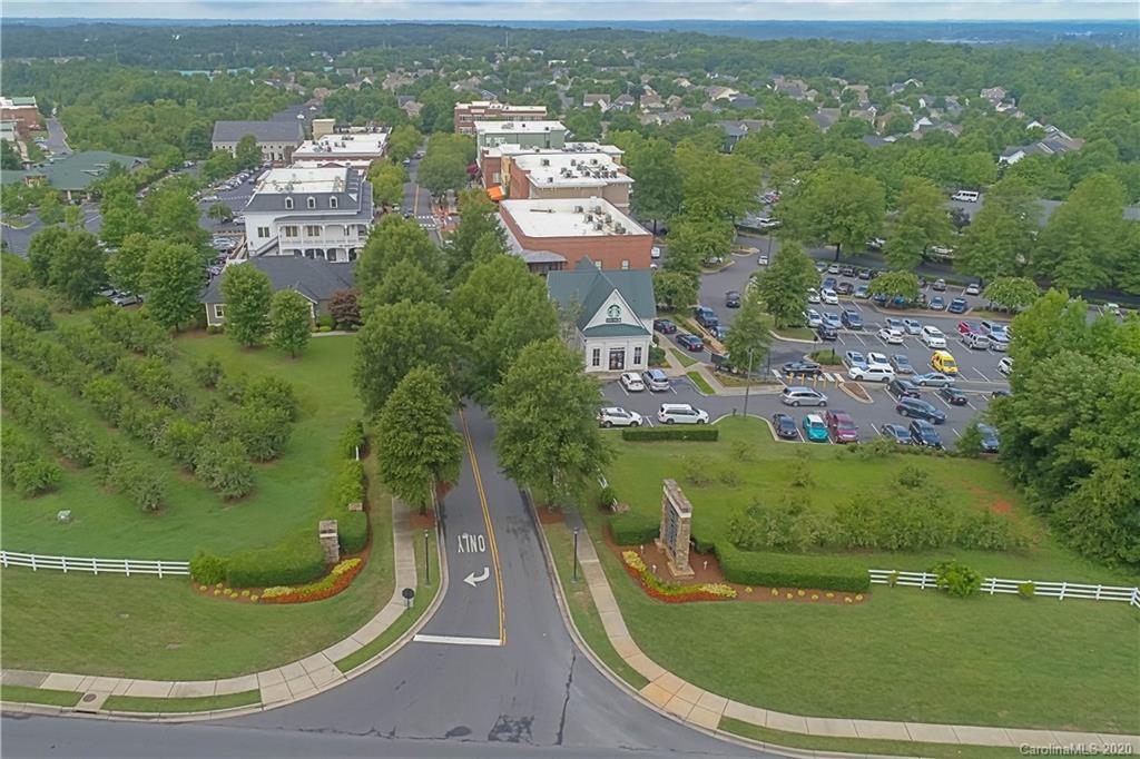 728 Shady Grove Crossing Fort Mill, SC 29708 - Photo 41 of 41 an aerial view of residential houses with outdoor space and trees