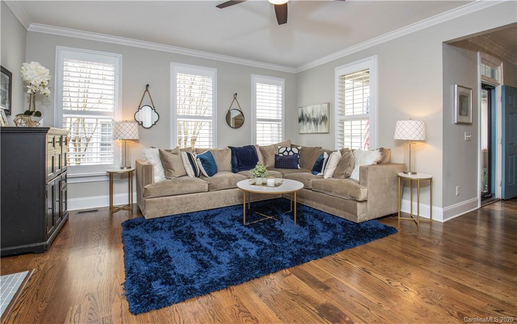 728 Shady Grove Crossing Fort Mill, SC 29708 - Photo 8 of 41 a living room with furniture a table and a large window