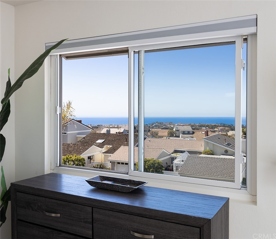 33525 Binnacle Drive Dana Point, CA 92629 - Photo 12 of 76 a view of a living room with a floor to ceiling window and floor