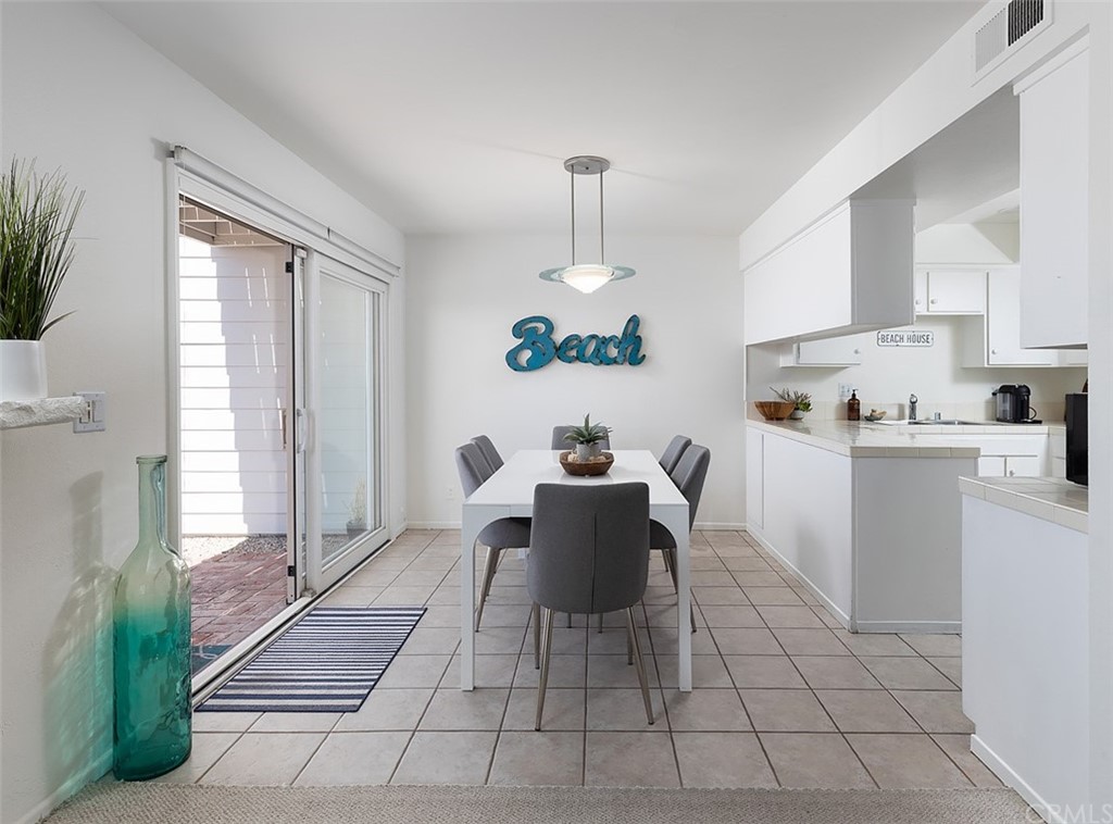 33525 Binnacle Drive Dana Point, CA 92629 - Photo 19 of 76 a dining room with furniture and a window