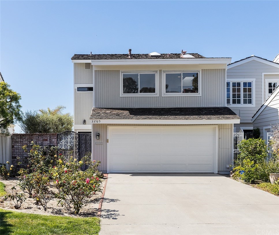 33525 Binnacle Drive Dana Point, CA 92629 - Photo 2 of 76 a house view with a garden space