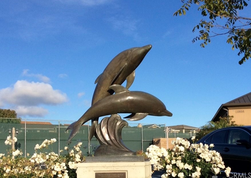 33525 Binnacle Drive Dana Point, CA 92629 - Photo 29 of 76 a roof deck with table and chairs and potted plants
