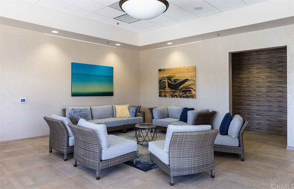 33525 Binnacle Drive Dana Point, CA 92629 - Photo 67 of 76 a living room with furniture and a flat screen tv