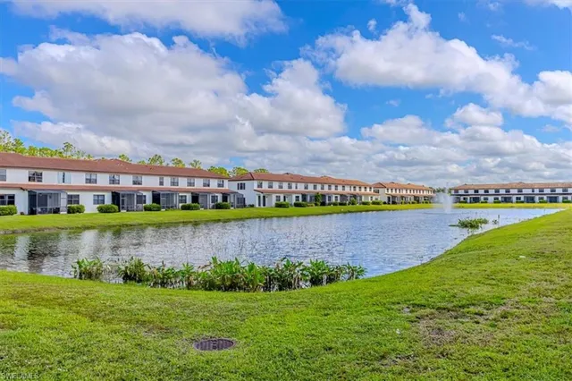a view of a lake with a big yard
