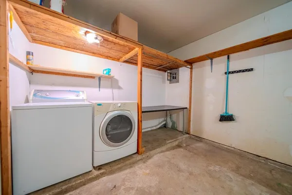 a utility room with dryer and washer
